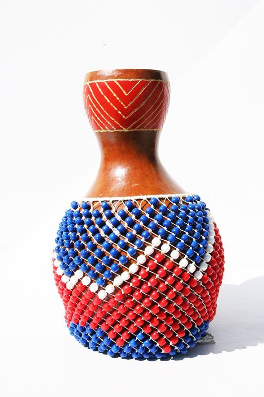 Traditional beaded shekere instrument